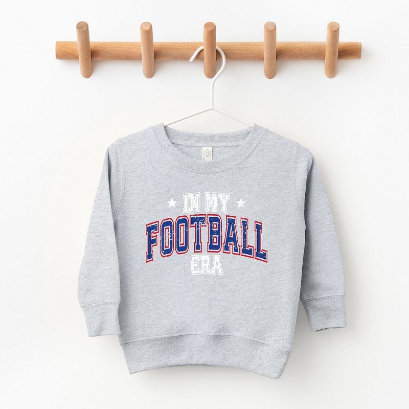 متجر جونيبر في عصر كرة القدم - سويت شيرت أزرق للشباب فائق النعومة برسومات جرافيكية