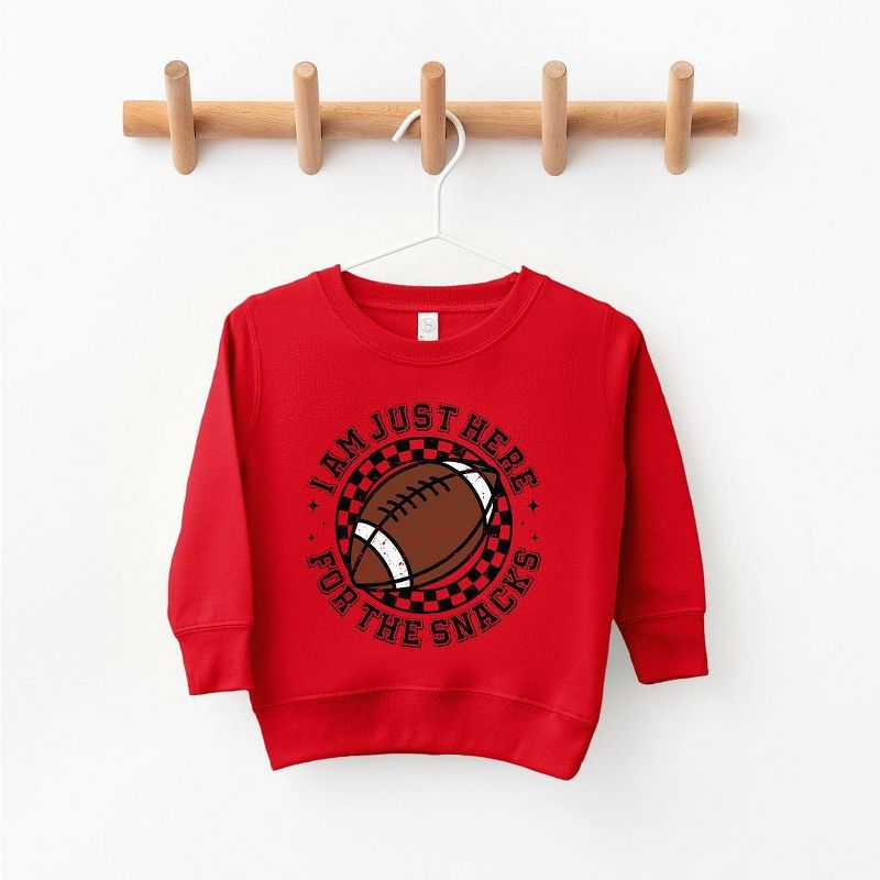 The Juniper Shop I Am Just Here For The Snacks Youth Ultra-Soft Graphic Sweatshirt