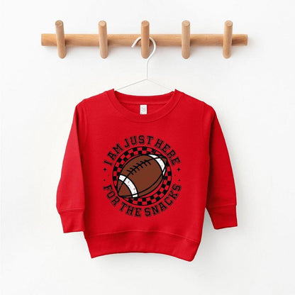 The Juniper Shop I Am Just Here For The Snacks Youth Ultra-Soft Graphic Sweatshirt