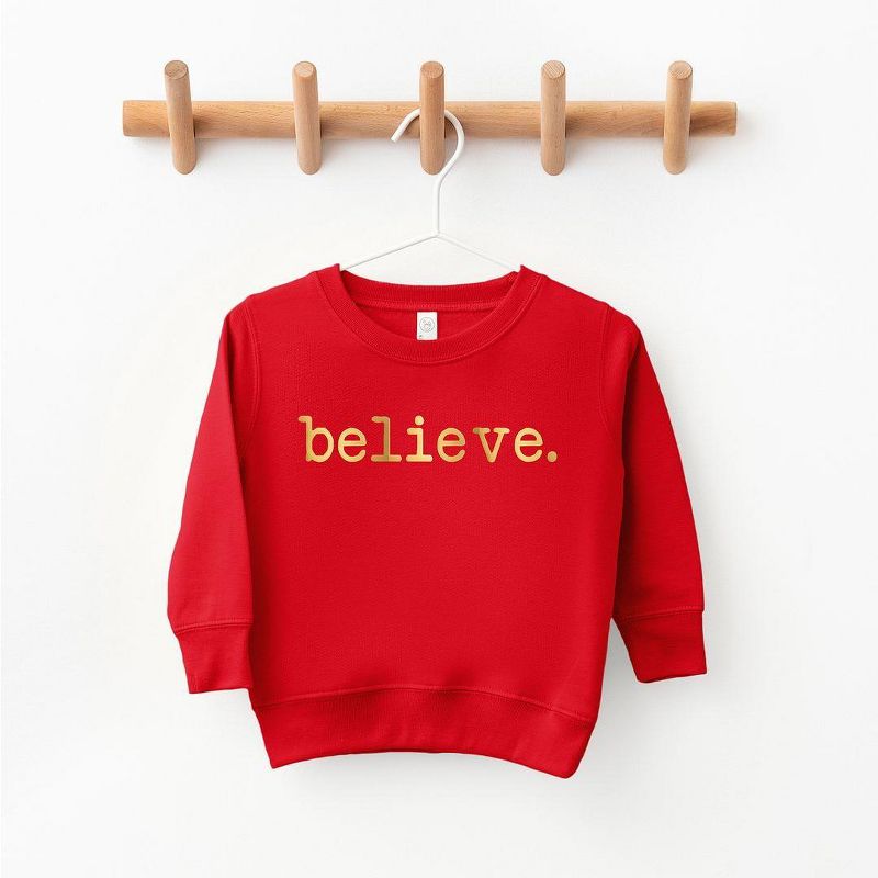 The Juniper Shop Believe Puff Print Toddler Graphic Sweatshirt