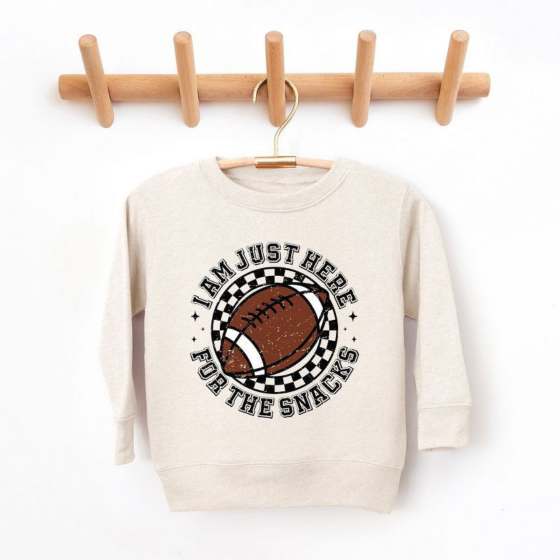 The Juniper Shop I Am Just Here For The Snacks Youth Ultra-Soft Graphic Sweatshirt