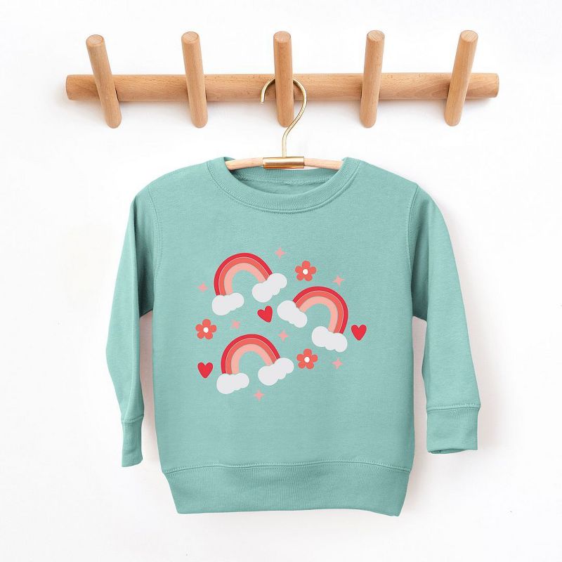 سويت شيرت جرافيكي ناعم للغاية بتصميم قوس قزح لعيد الحب من متجر جونيبر