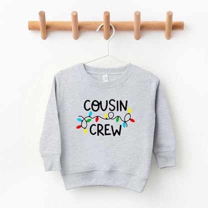 The Juniper Shop Cousin Crew Lights Toddler Graphic Sweatshirt