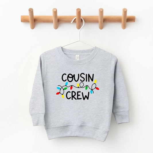 The Juniper Shop Cousin Crew Lights Toddler Graphic Sweatshirt
