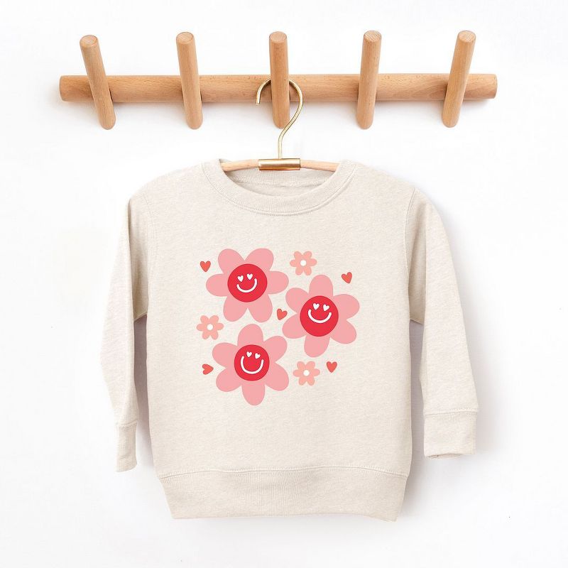 سويت شيرت جرافيكي ناعم للغاية بطبعة زهور الحب الهيبية من ذا جونيبر شوب