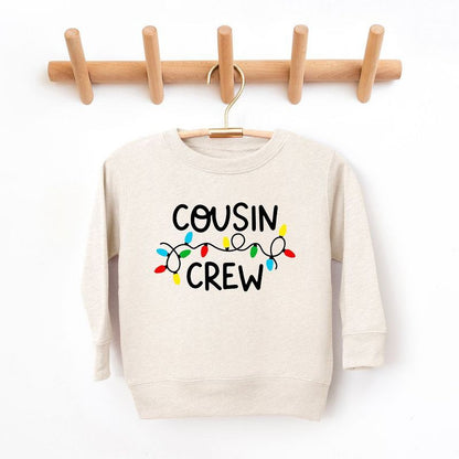 The Juniper Shop Cousin Crew Lights Toddler Graphic Sweatshirt