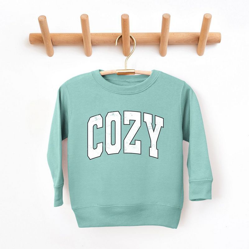 The Juniper Shop Cozy Worn Varsity Youth Ultra-Soft Graphic Sweatshirt