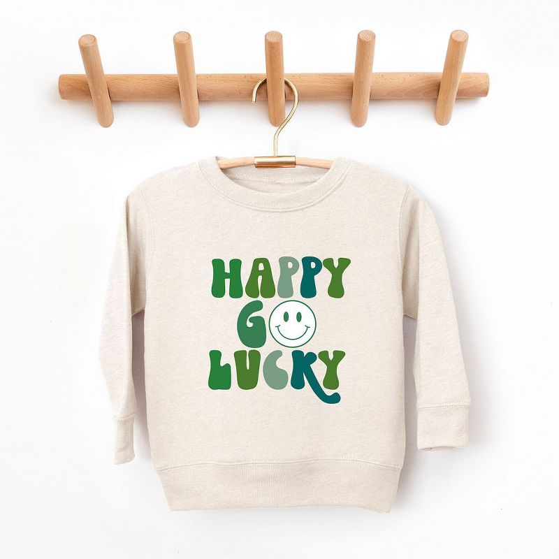 سويت شيرت جرافيكي ناعم للغاية بطبعة وجه مبتسم من ذا جونيبر شوب