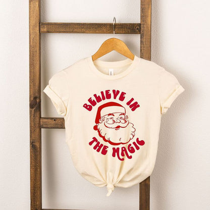 تي شيرت بأكمام قصيرة للشباب من Juniper Shop Believe In The Magic Santa