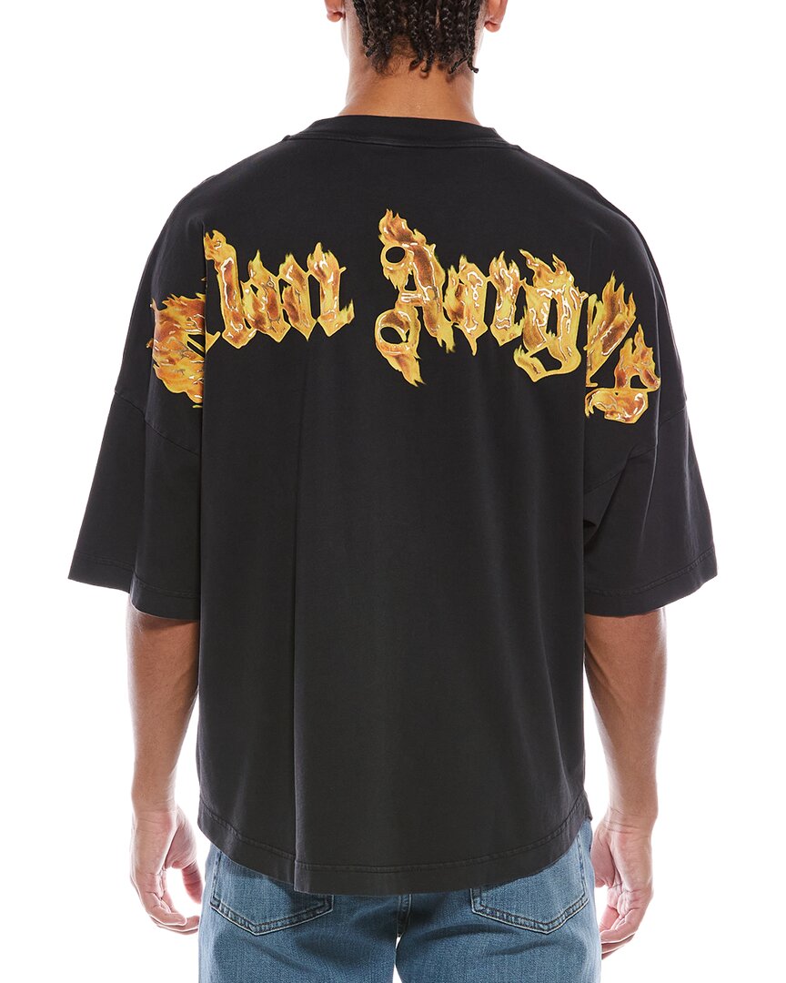burning palm over t-shirt