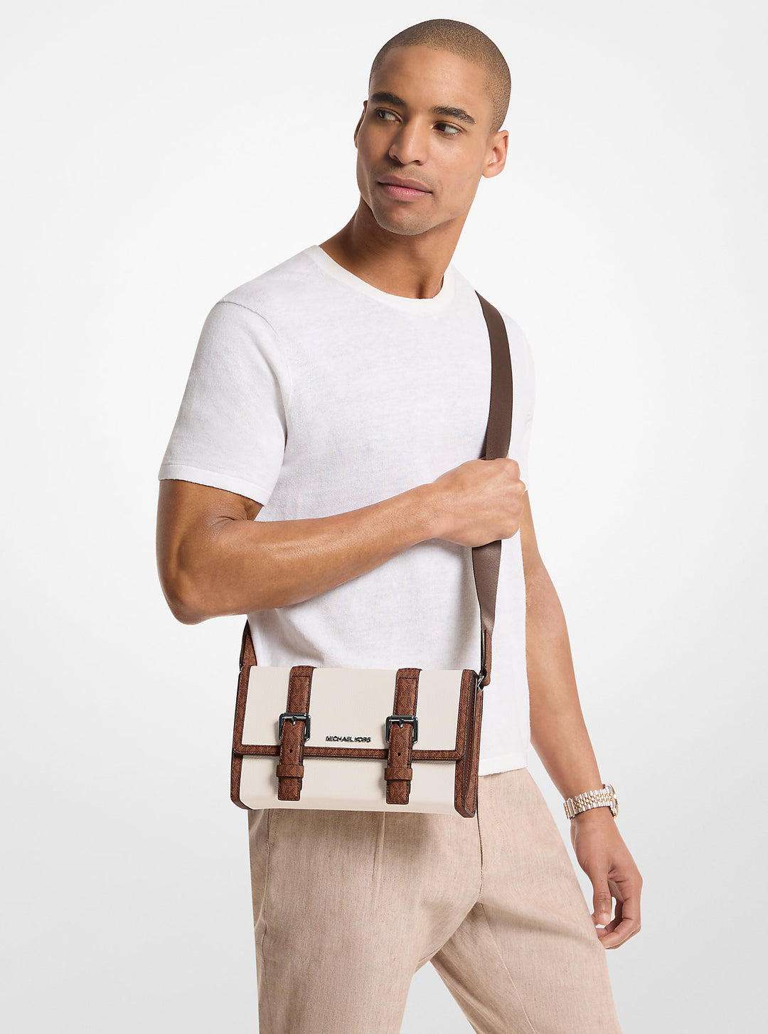 cooper pebbled leather and signature logo trunk crossbody bag