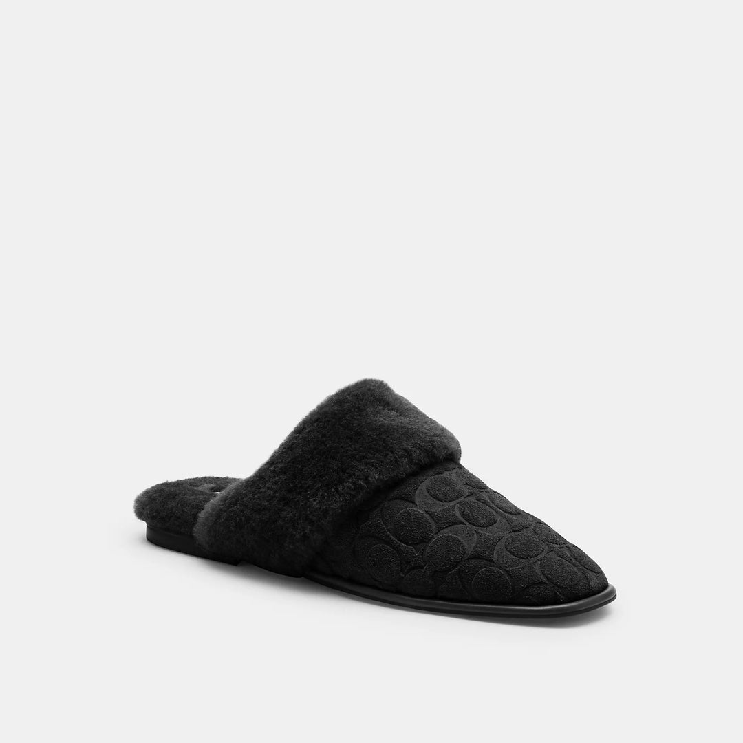 sherpa flat mule in signature suede