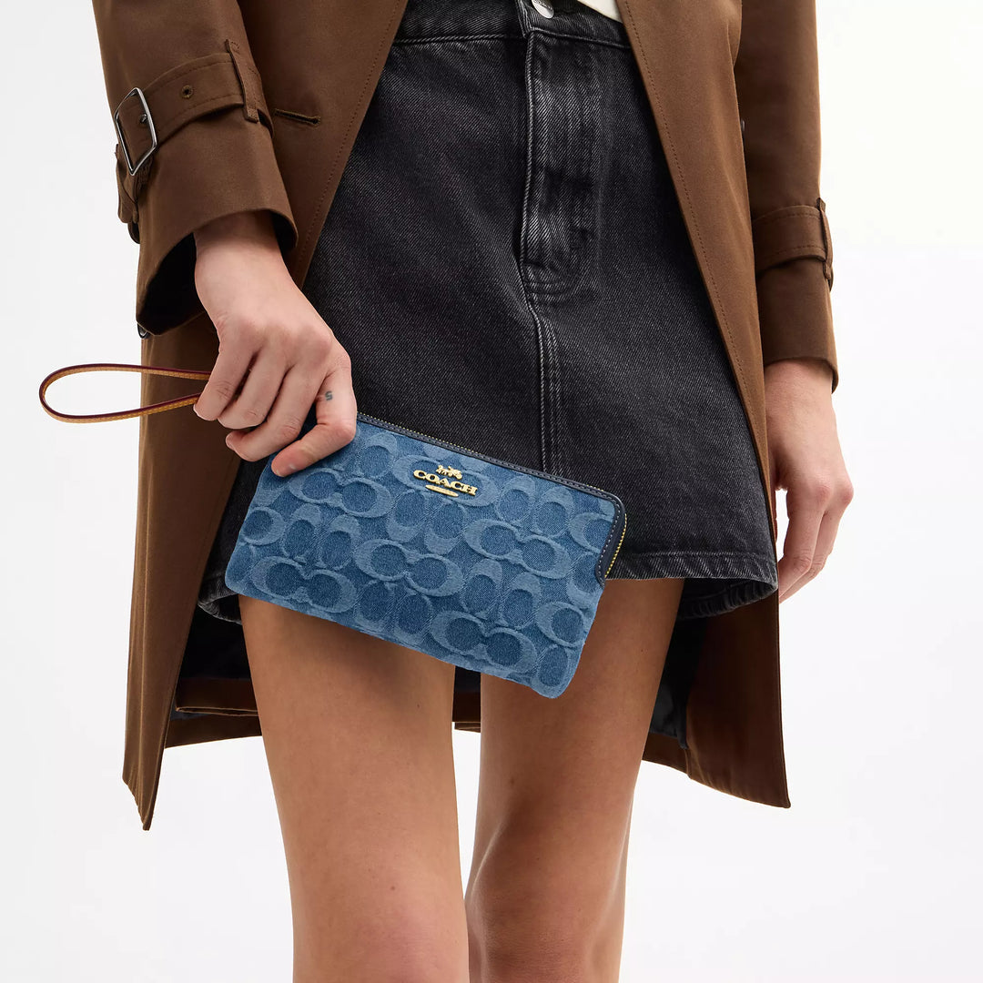 large corner zip wristlet in signature denim