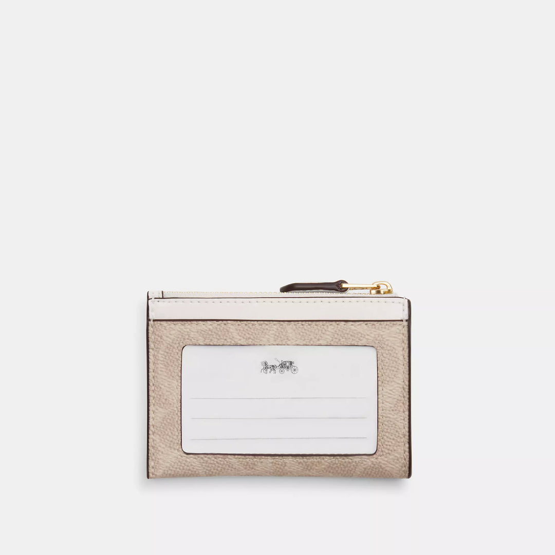 mini skinny id case in signature canvas