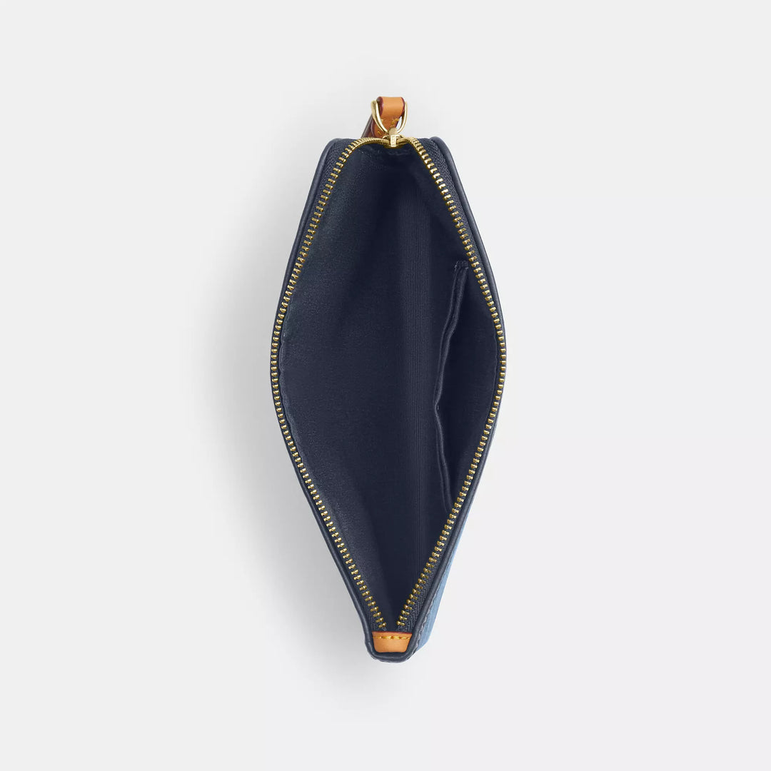 large corner zip wristlet in signature denim