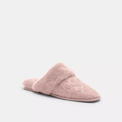 sherpa flat mule in signature suede