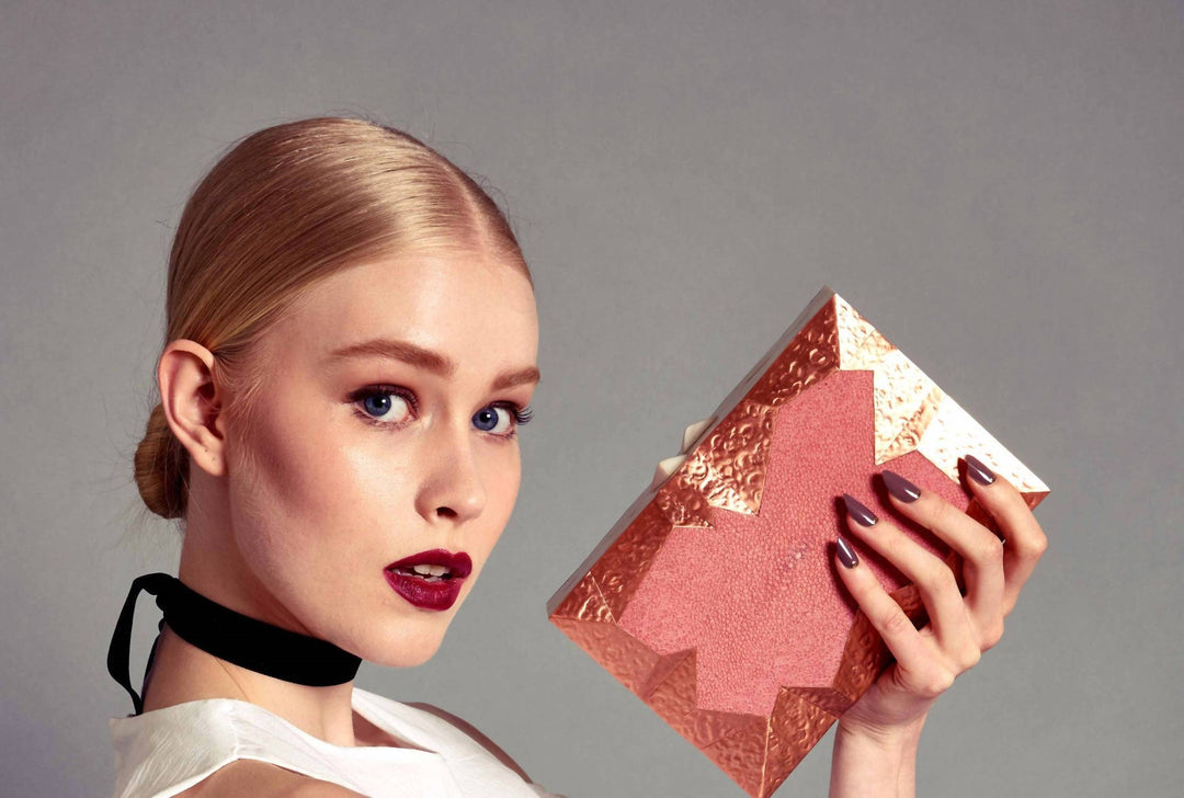 women's abrolhos clutch bag in rose gold brass