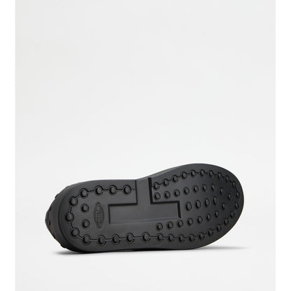 no_code x in leather and technical fabric