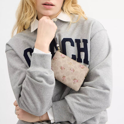 corner zip wristlet in signature canvas with floral print