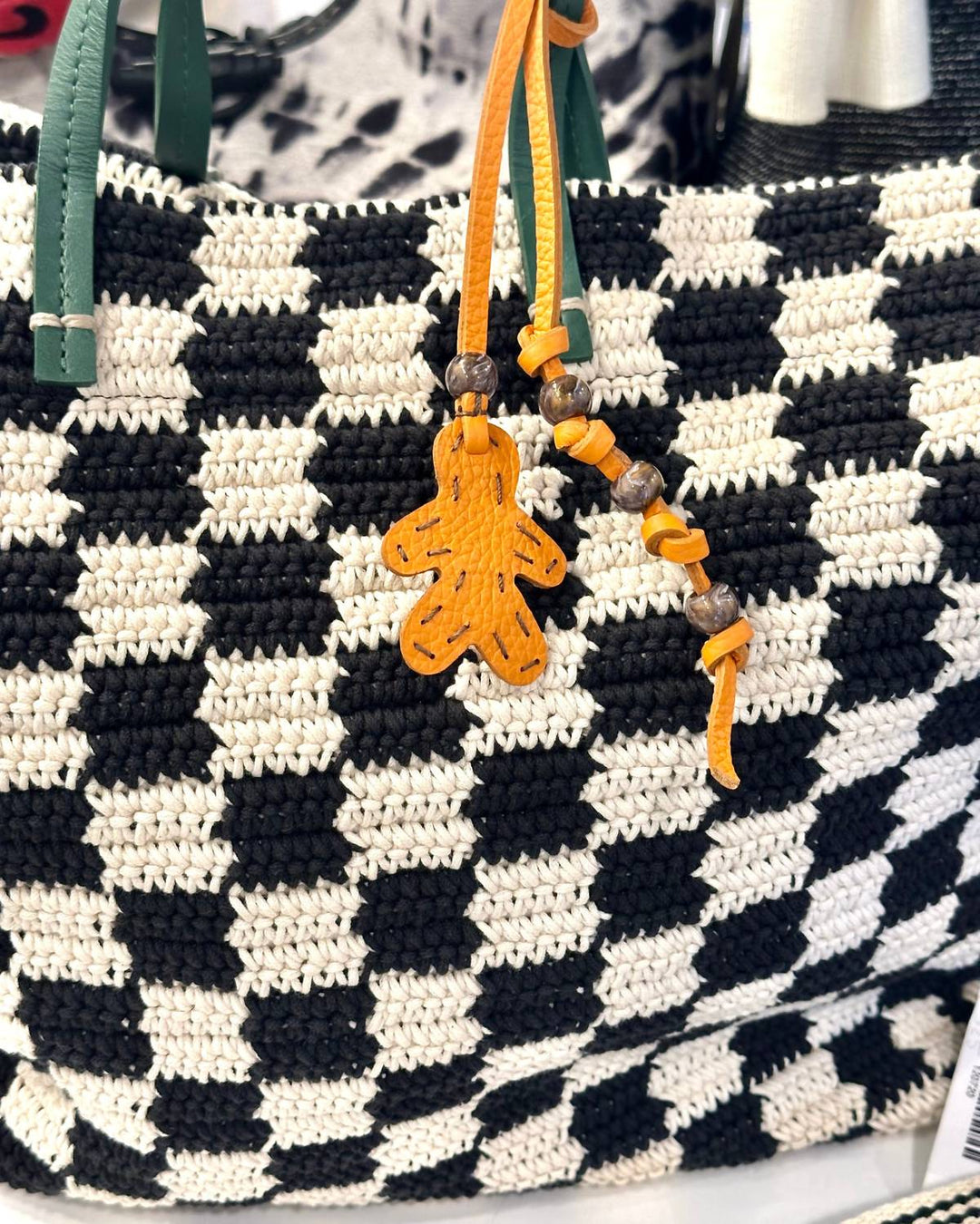 women's little men bag charms in orange