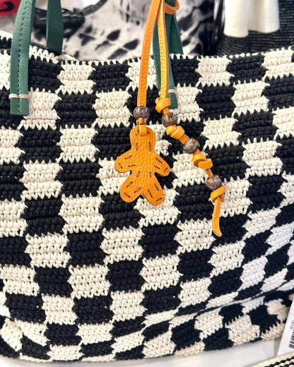 women's little men bag charms in orange