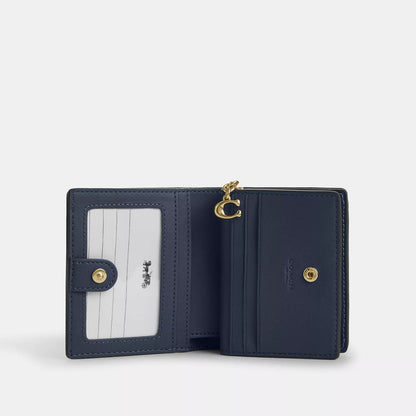 snap wallet in signature denim