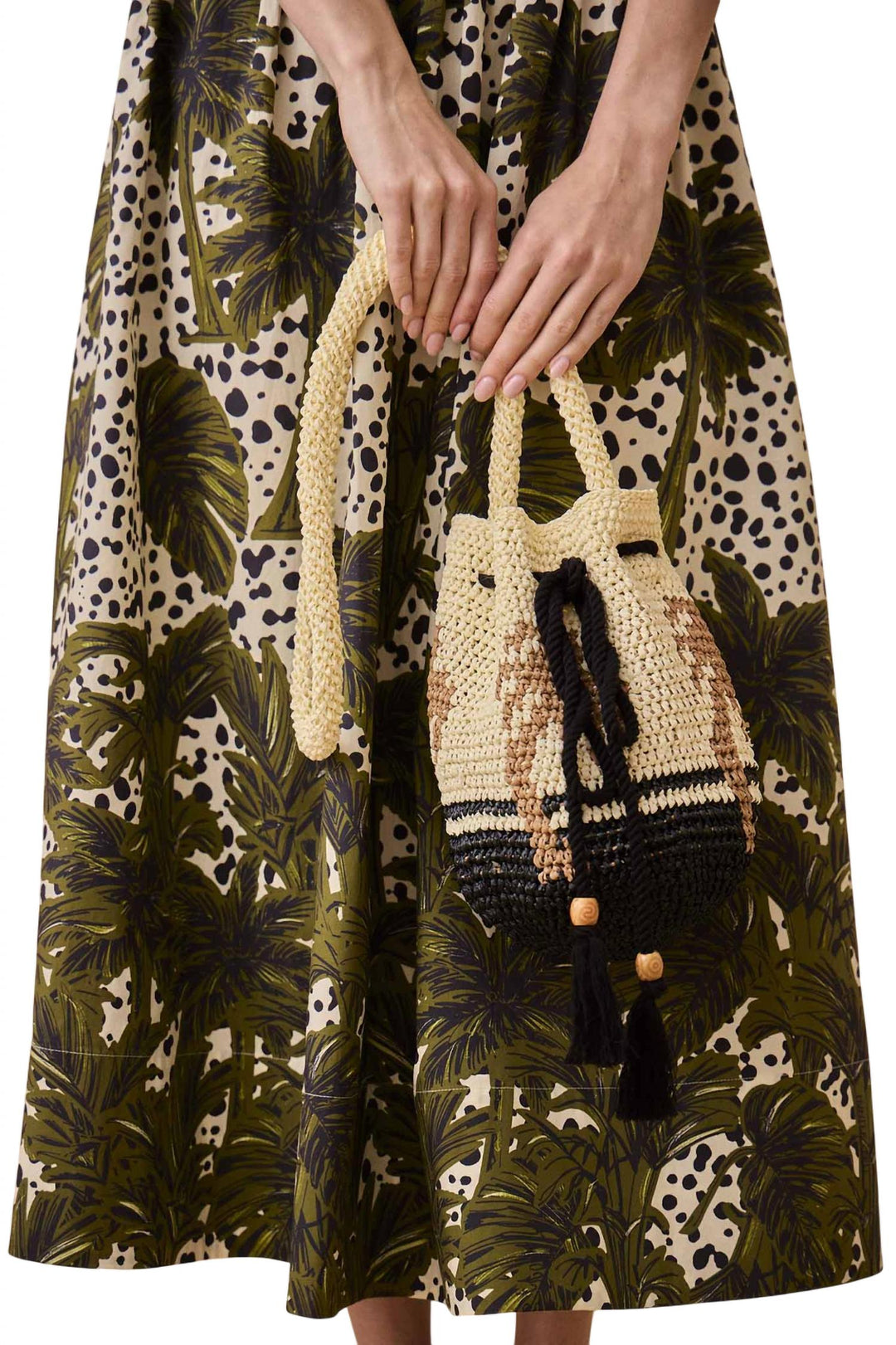 raffia bucket bag in palm tree