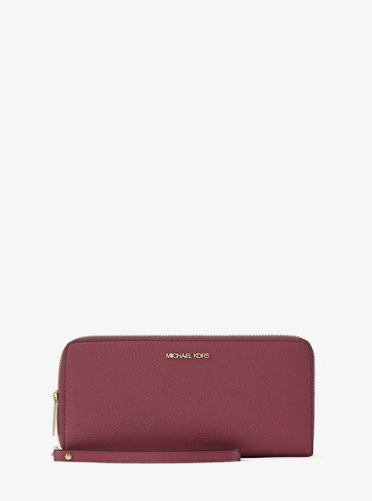 jet set travel large pebbled leather wristlet
