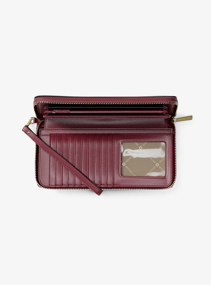 jet set travel large pebbled leather wristlet