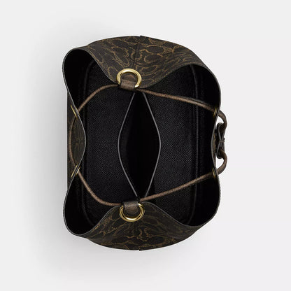 rowan bucket bag in loved signature canvas with charms