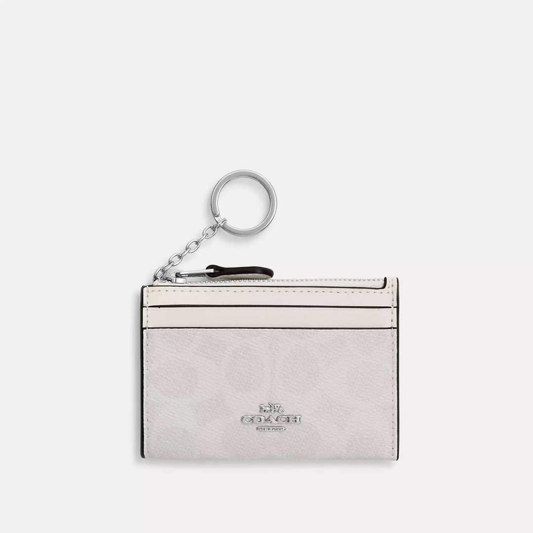 mini skinny id case in signature canvas