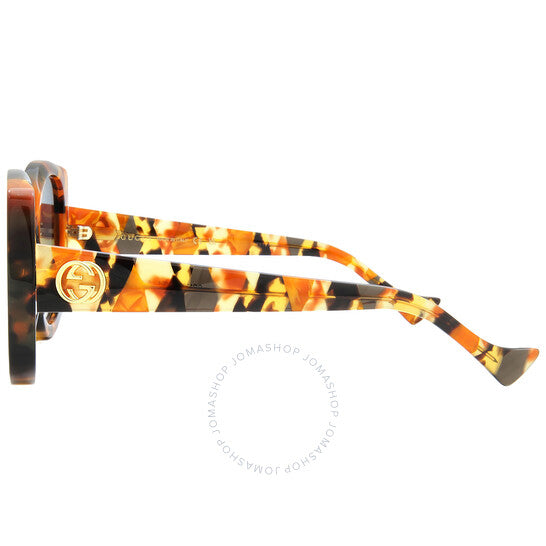 نظارات شمسية نسائية من غوتشي بتصميم فراشة متدرجة اللون باللون الأزرق