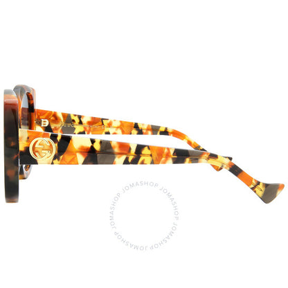 نظارات شمسية نسائية من غوتشي بتصميم فراشة متدرجة اللون باللون الأزرق