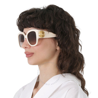 غوتشي، نظارة شمسية نسائية على شكل فراشة بنية اللون
