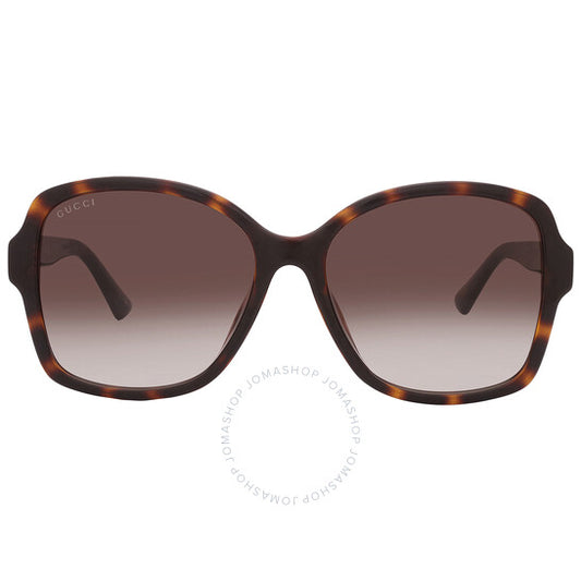 نظارات شمسية نسائية من غوتشي، بتصميم فراشة متدرجة اللون، باللون البني