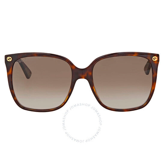 نظارة شمسية نسائية من غوتشي، بتصميم عين القطة باللون البني